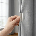 Magnetic curtain clips